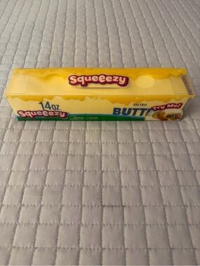 NWT Target Viral Sunny Days Squeezy Butter Shape Fidget Toy